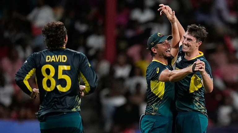 Pat Cummins celebrates his hat-trick with teammates during the Afghanistan vs Australia, ICC T20 World Cup 2024 match in St Vincent on Sunday (June 23). - AP/Ramon Espinosa